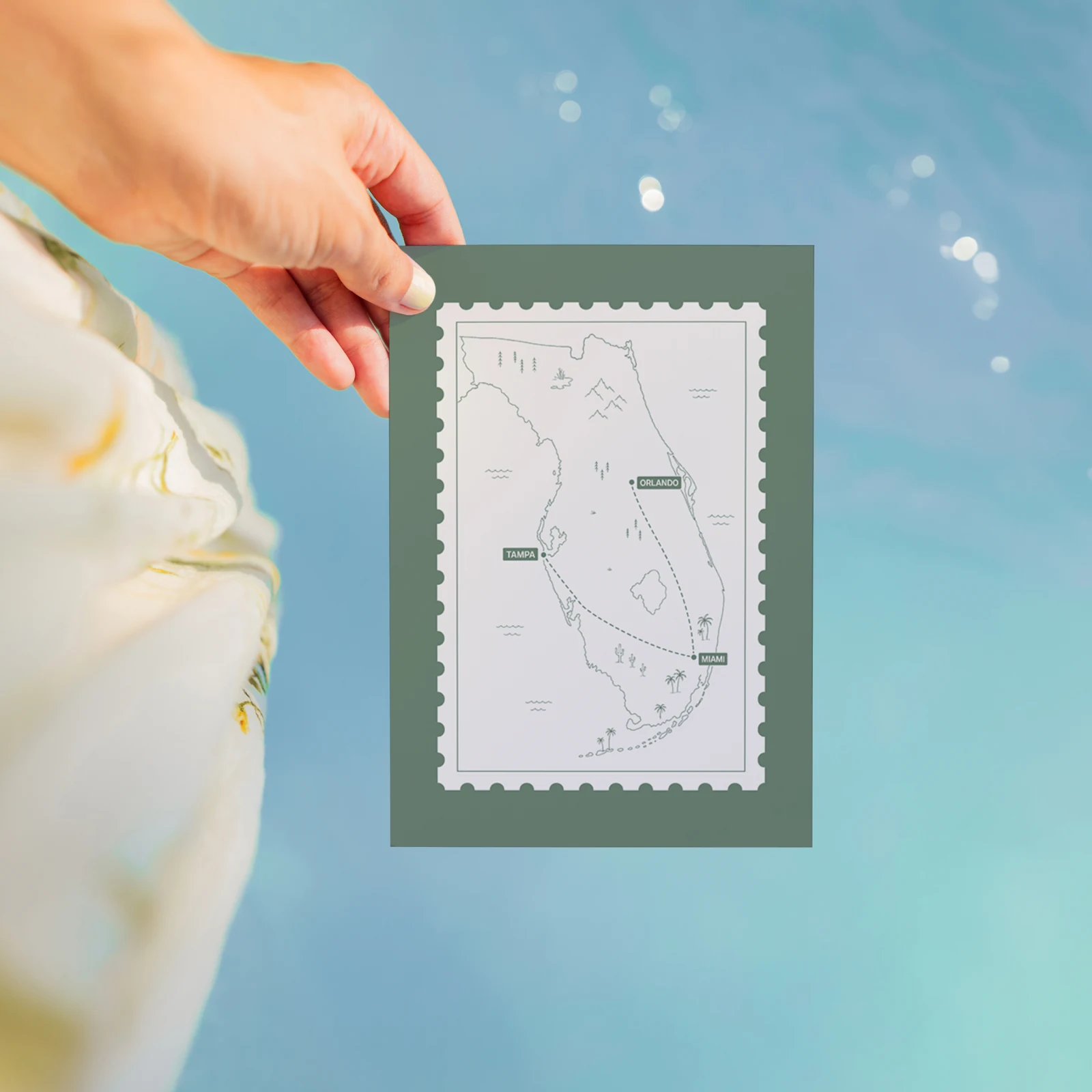 A Travel Card with a line-art map of a trip, framed like a stamp