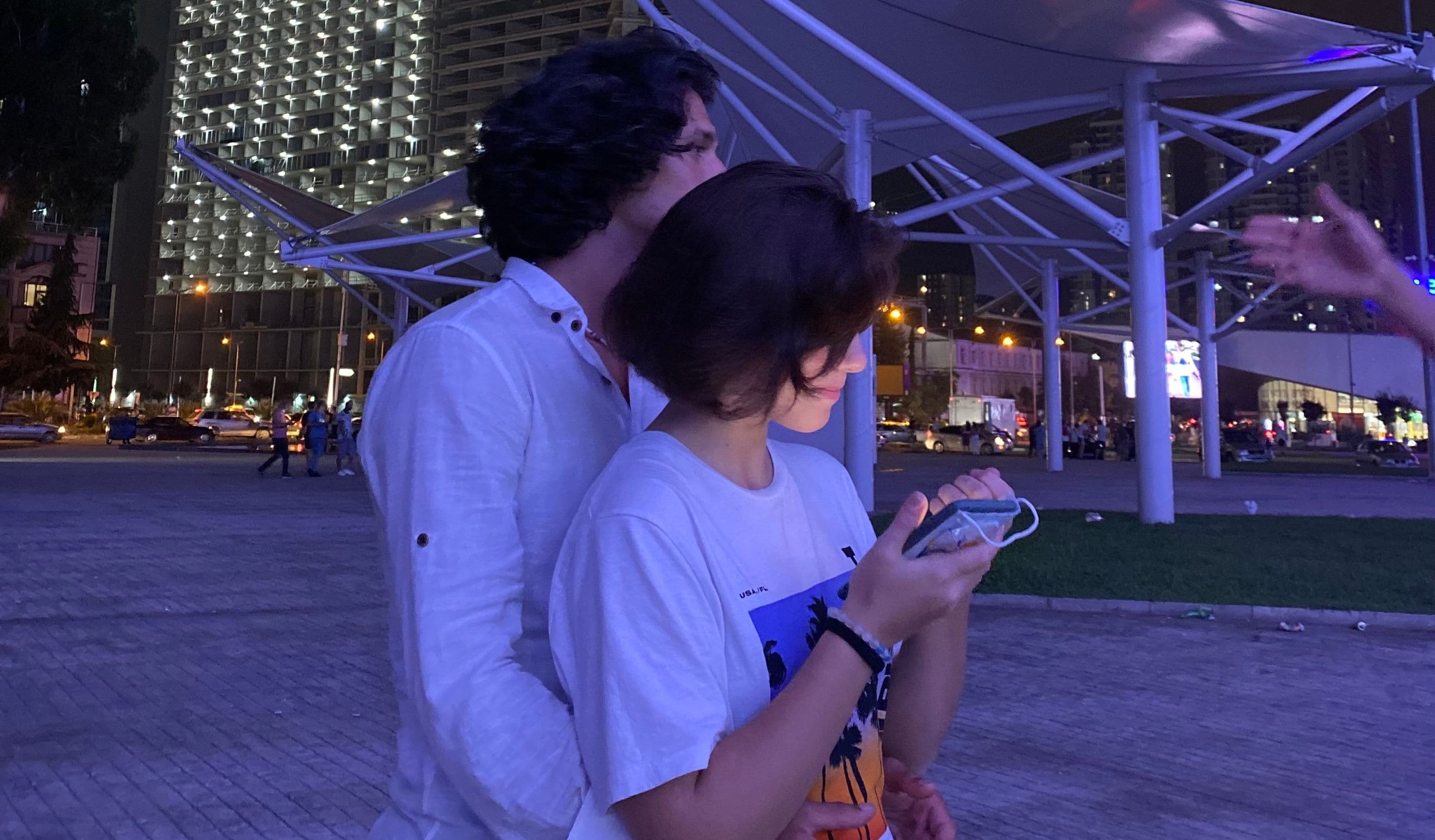 Couple holding each other