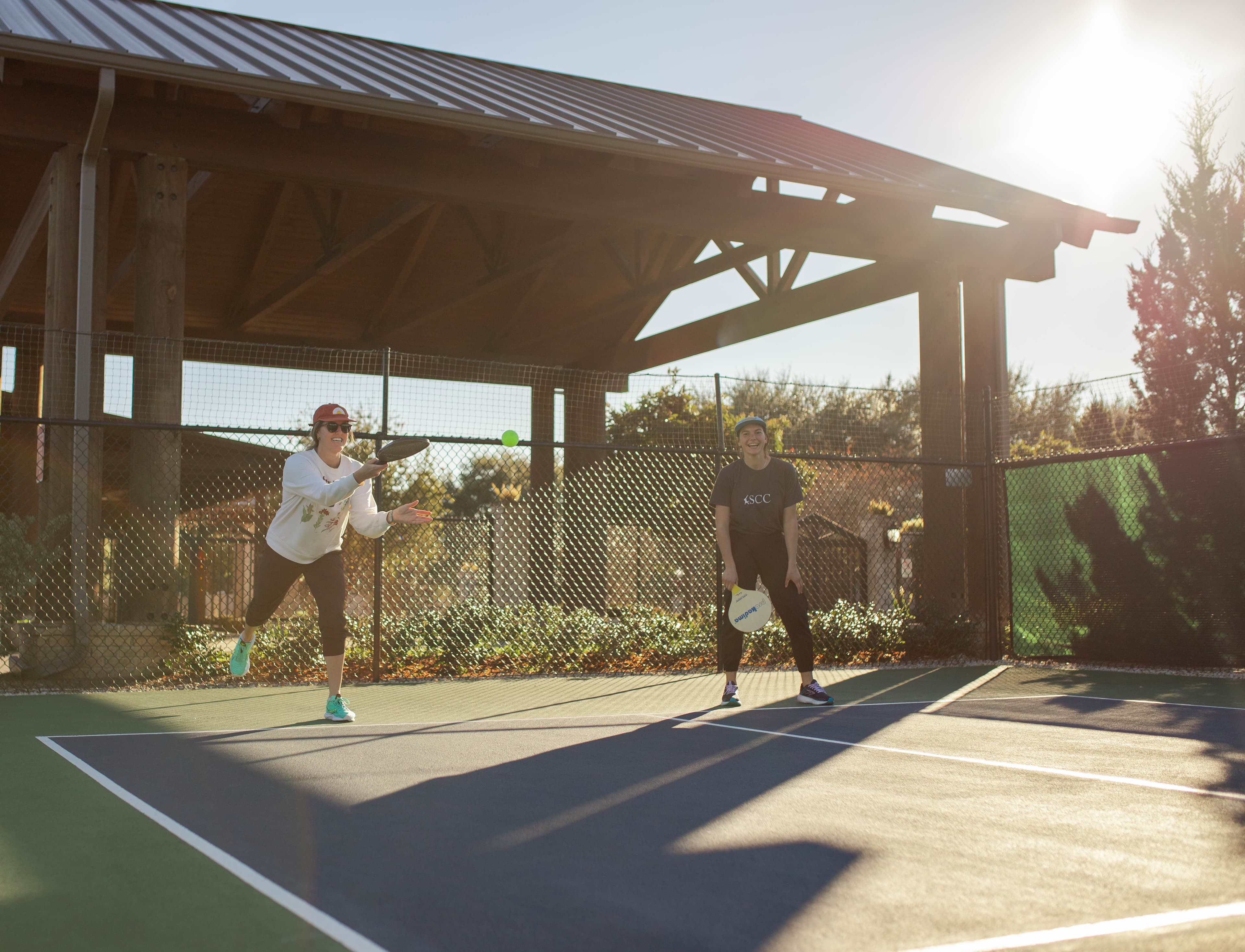sisters playing tennis