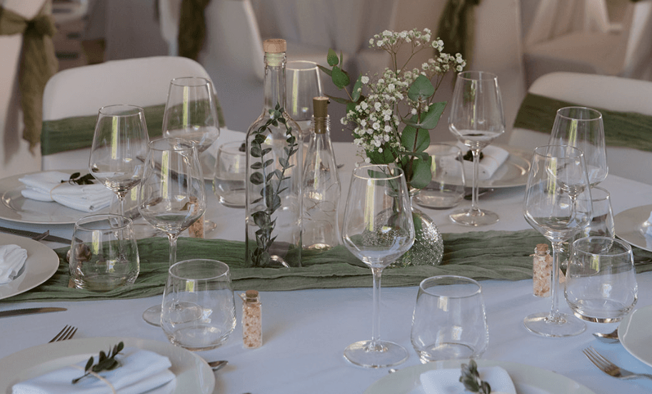Wedding table in white and sage colors