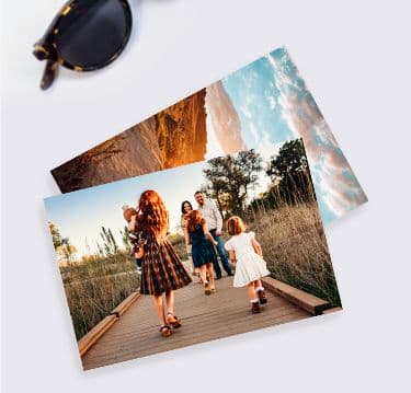 4x6 prints on a table with sunglasses