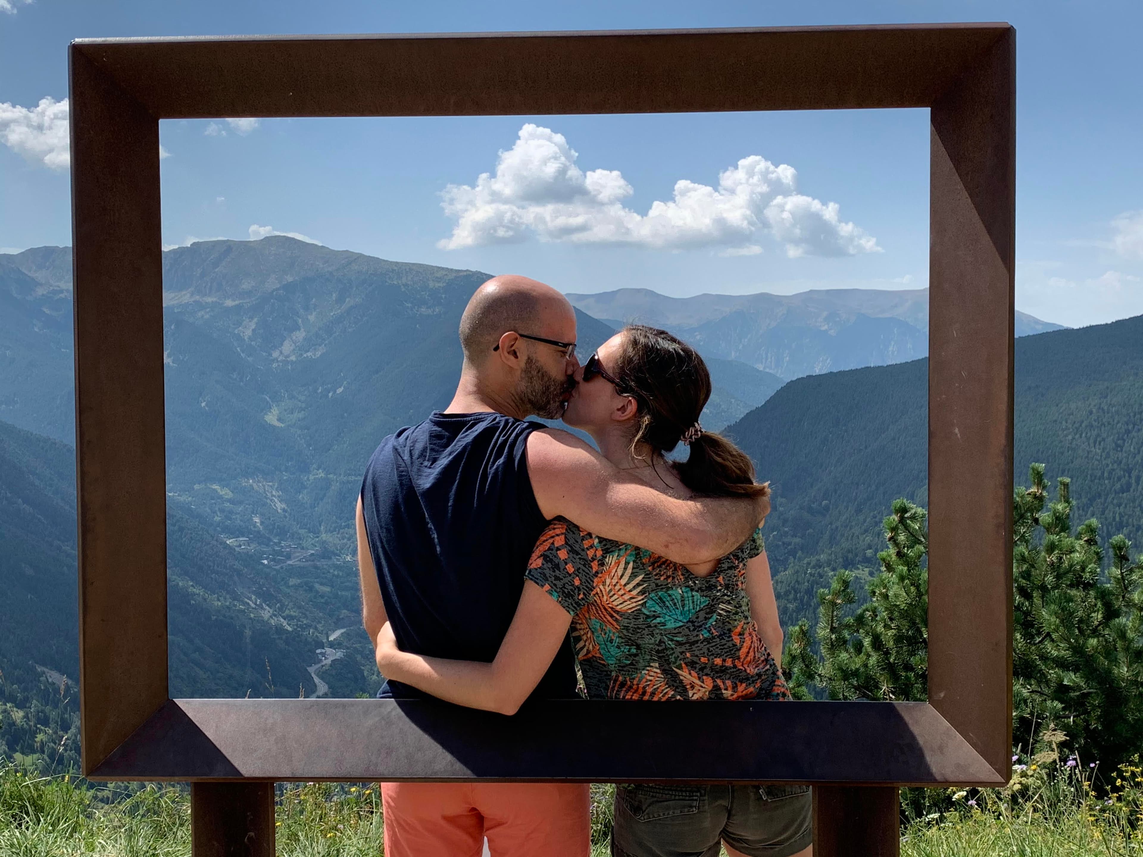 couple in front of a mountain