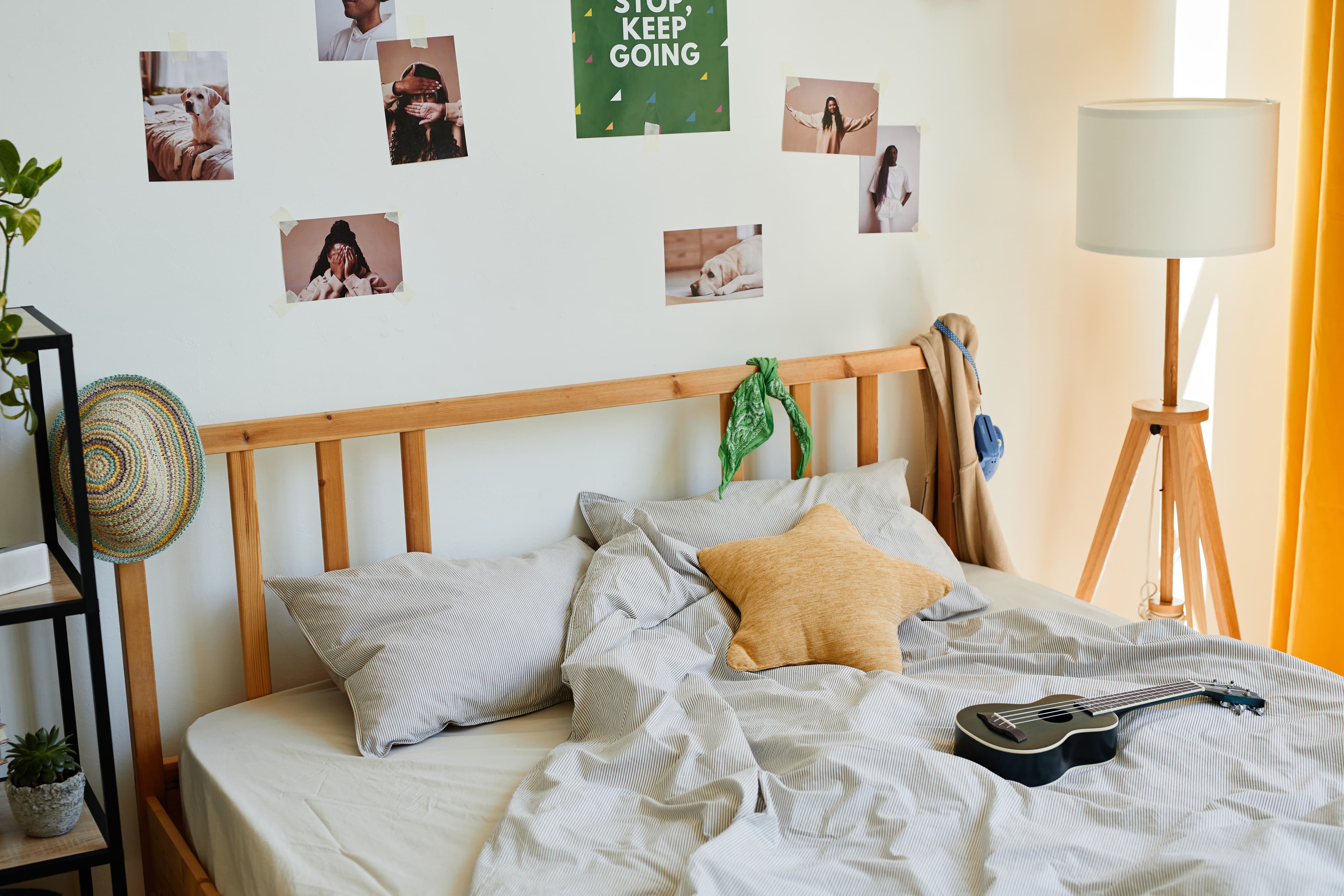 dorm room with prints