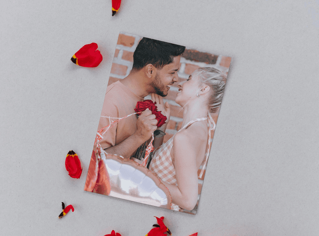 Print of couple looking at each other with flower petals