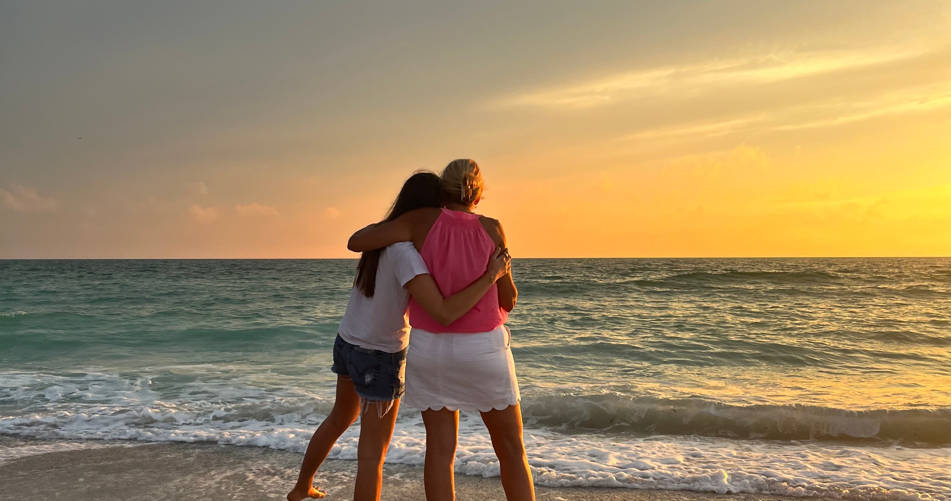 hugging on the beach