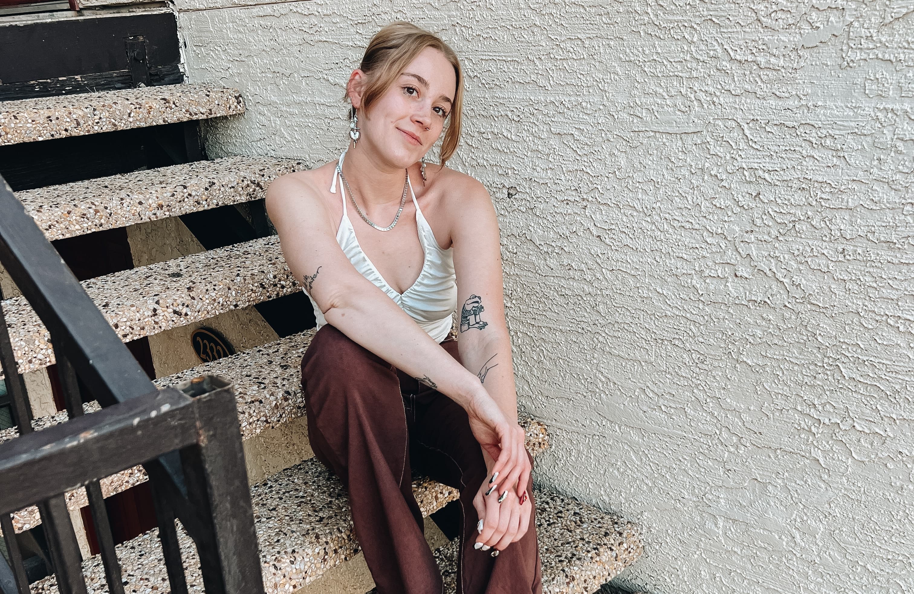 girl sitting on the steps