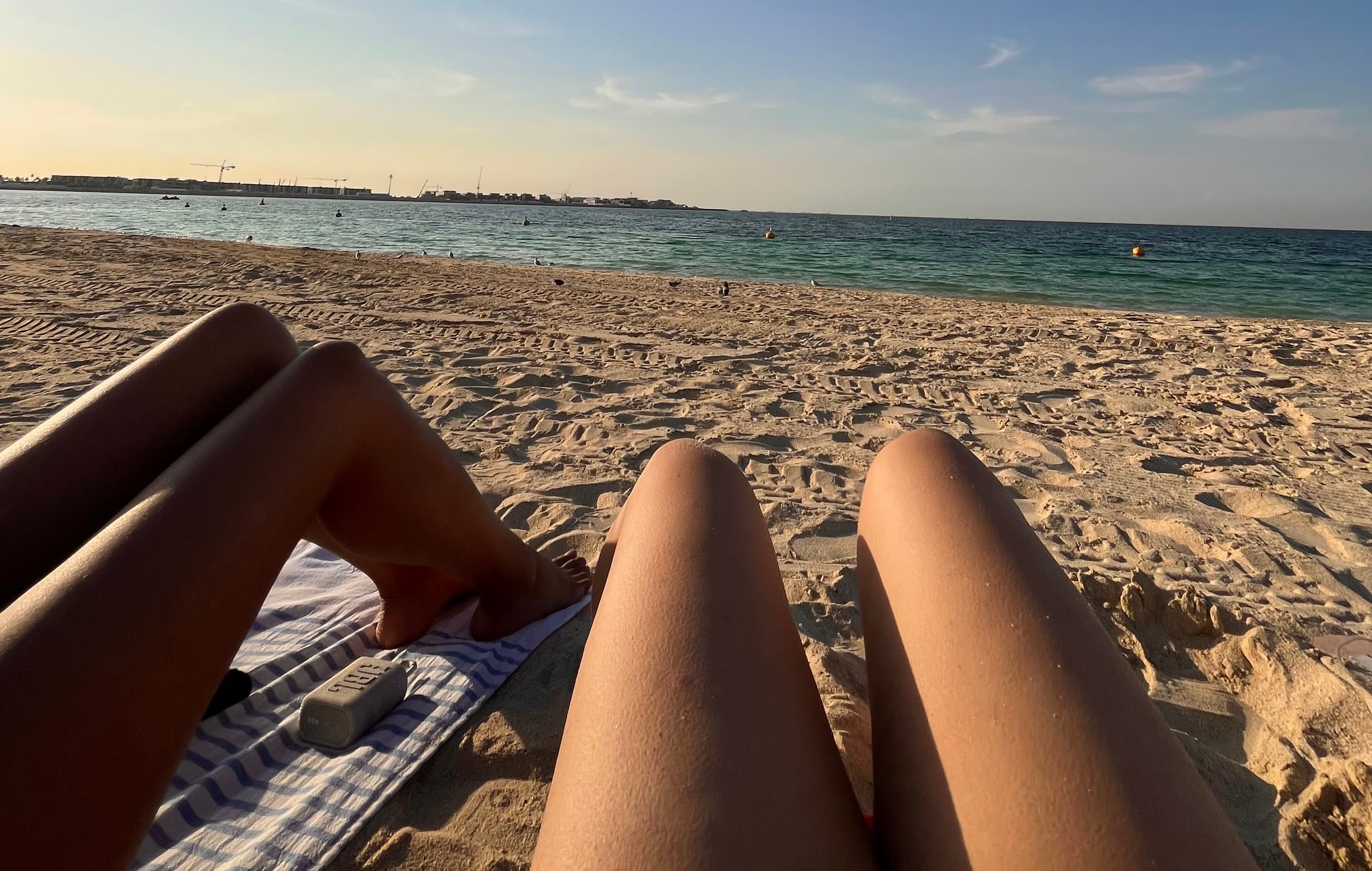 tan legs at the beach