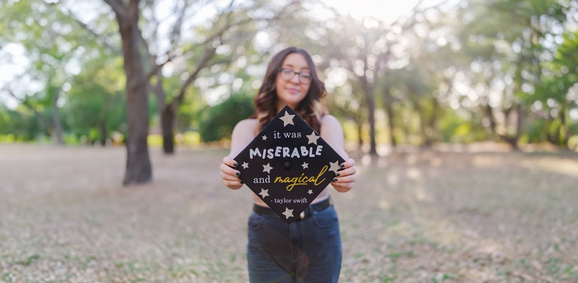 girl with taylotr swift grad cap